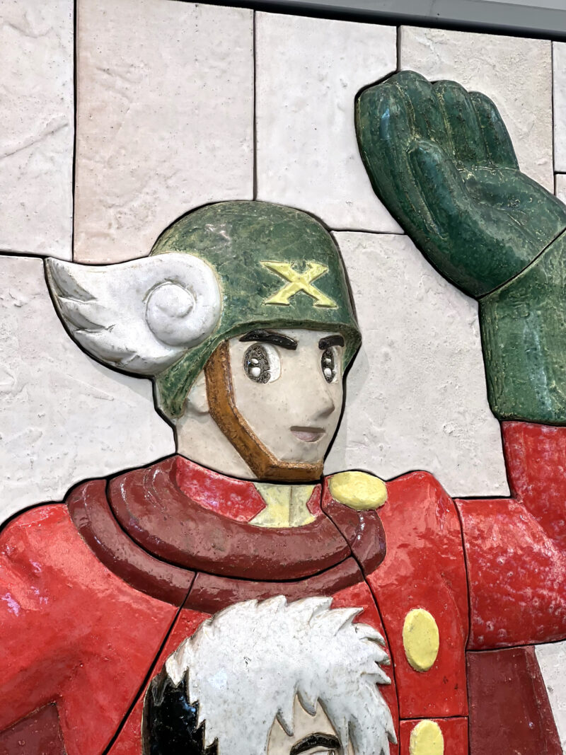 Tezuka Osamu - Characters on Parade, 2019, 460 ceramic tiles, 2.6 meters high, 8.8 meters wide, installation view, Kokusai-Tenjijō station, Kōtō, Tokyo, Japan