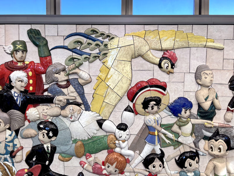 Tezuka Osamu - Characters on Parade, 2019, 460 ceramic tiles, 2.6 meters high, 8.8 meters wide, installation view, Kokusai-Tenjijō station, Kōtō, Tokyo, Japan