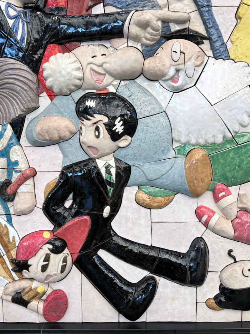 Tezuka Osamu - Characters on Parade, 2019, 460 ceramic tiles, 2.6 meters high, 8.8 meters wide, installation view, Kokusai-Tenjijō station, Kōtō, Tokyo, Japan