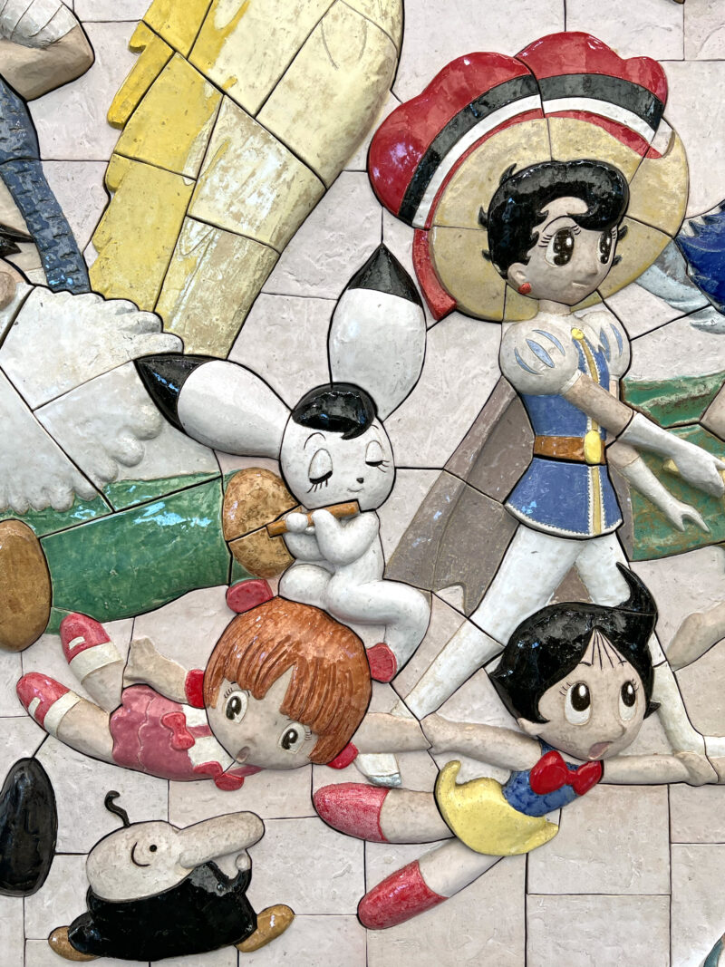 Tezuka Osamu - Characters on Parade, 2019, 460 ceramic tiles, 2.6 meters high, 8.8 meters wide, installation view, Kokusai-Tenjijō station, Kōtō, Tokyo, Japan