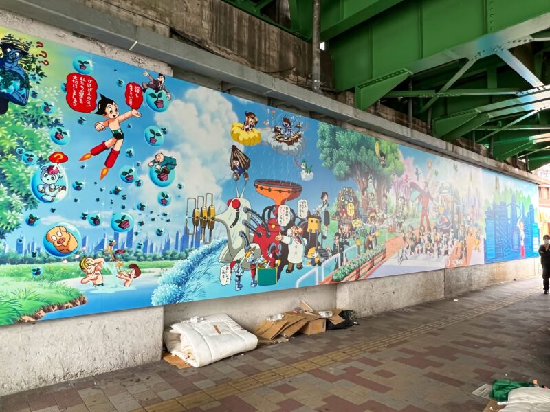 Tezuka Osamu – Save the Earth of Glass, installation view, Takadanobaba station, Tokyo, Japan