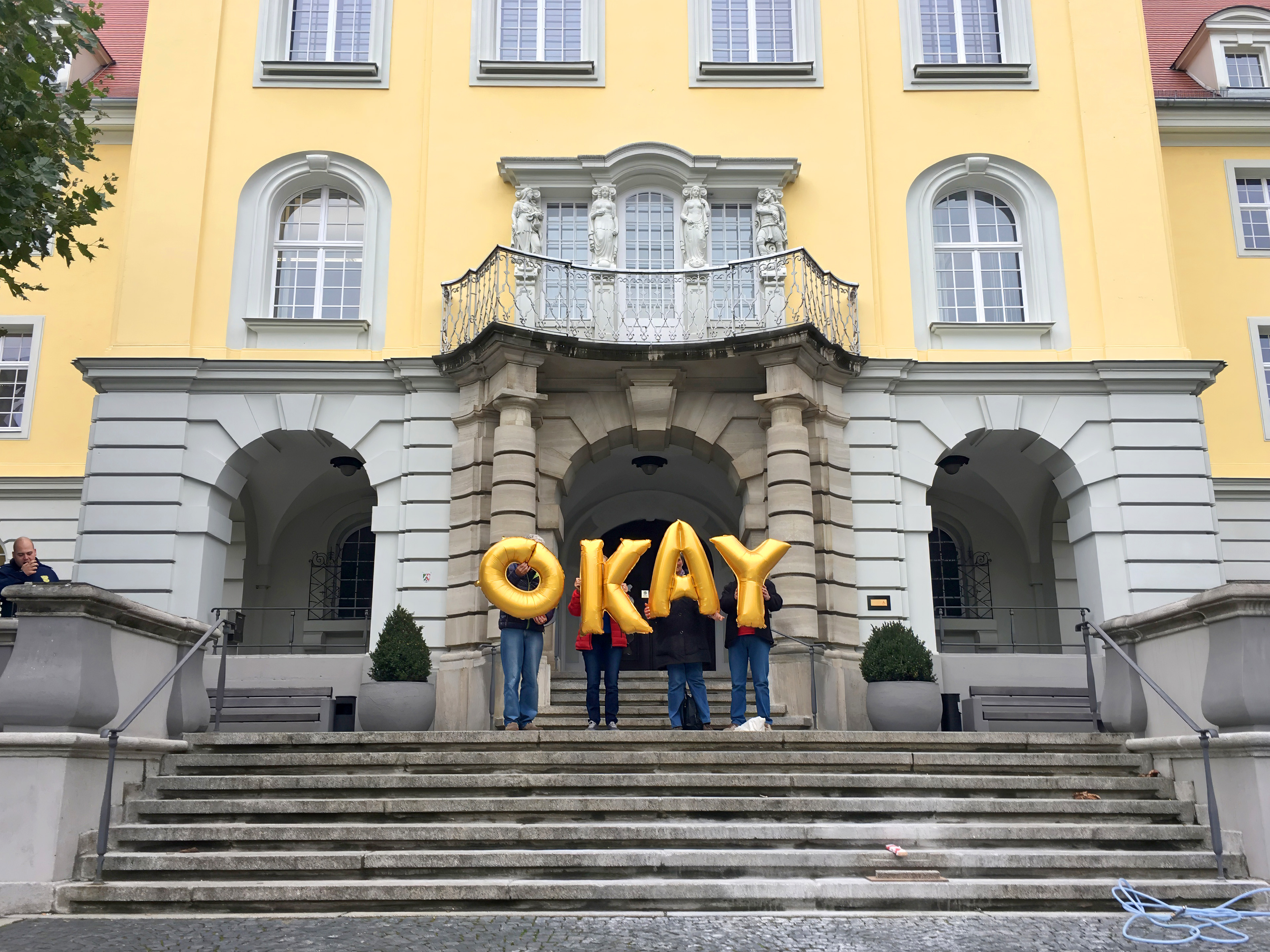 Germany, Herford, Rathaus - Okay, Silence was Golden, gold balloons